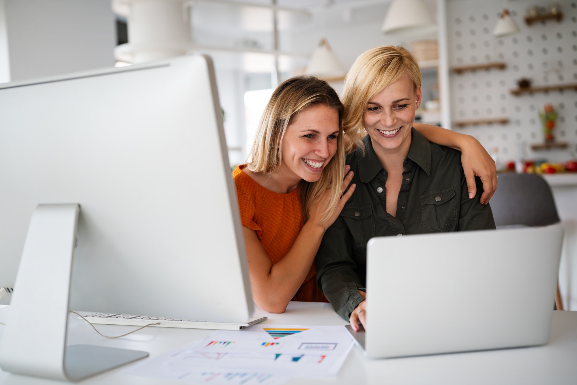 Startup business partners women working together in office